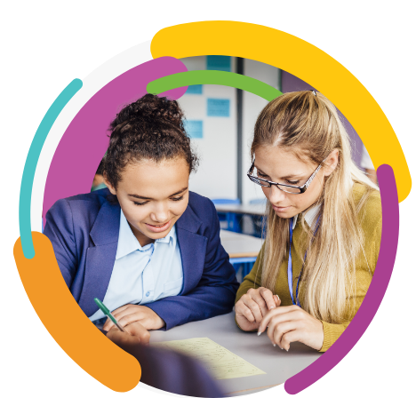 A teacher assisting a student with their assignment